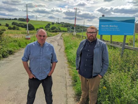 Councillor Andrew Cooper and Matt Edwards standing at the entrance to North Bierley Water Works